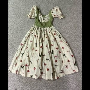 Vintage 1950s Novelty print dress with puff sleeves XS